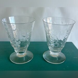 2 Etched crystal, footed cordial glasses. 4 1/8”
